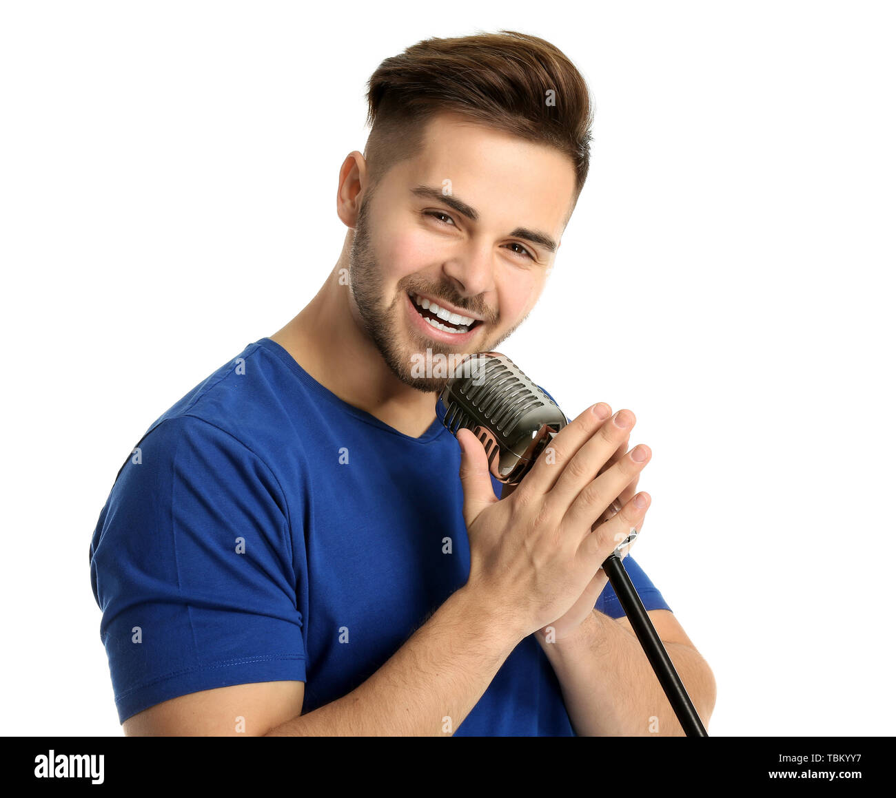 Handsome Male Singer With Microphone On White Background Stock
