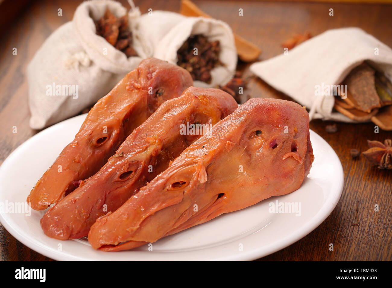 Duck neck spiced duck neck brine duck neck Stock Photo Alamy
