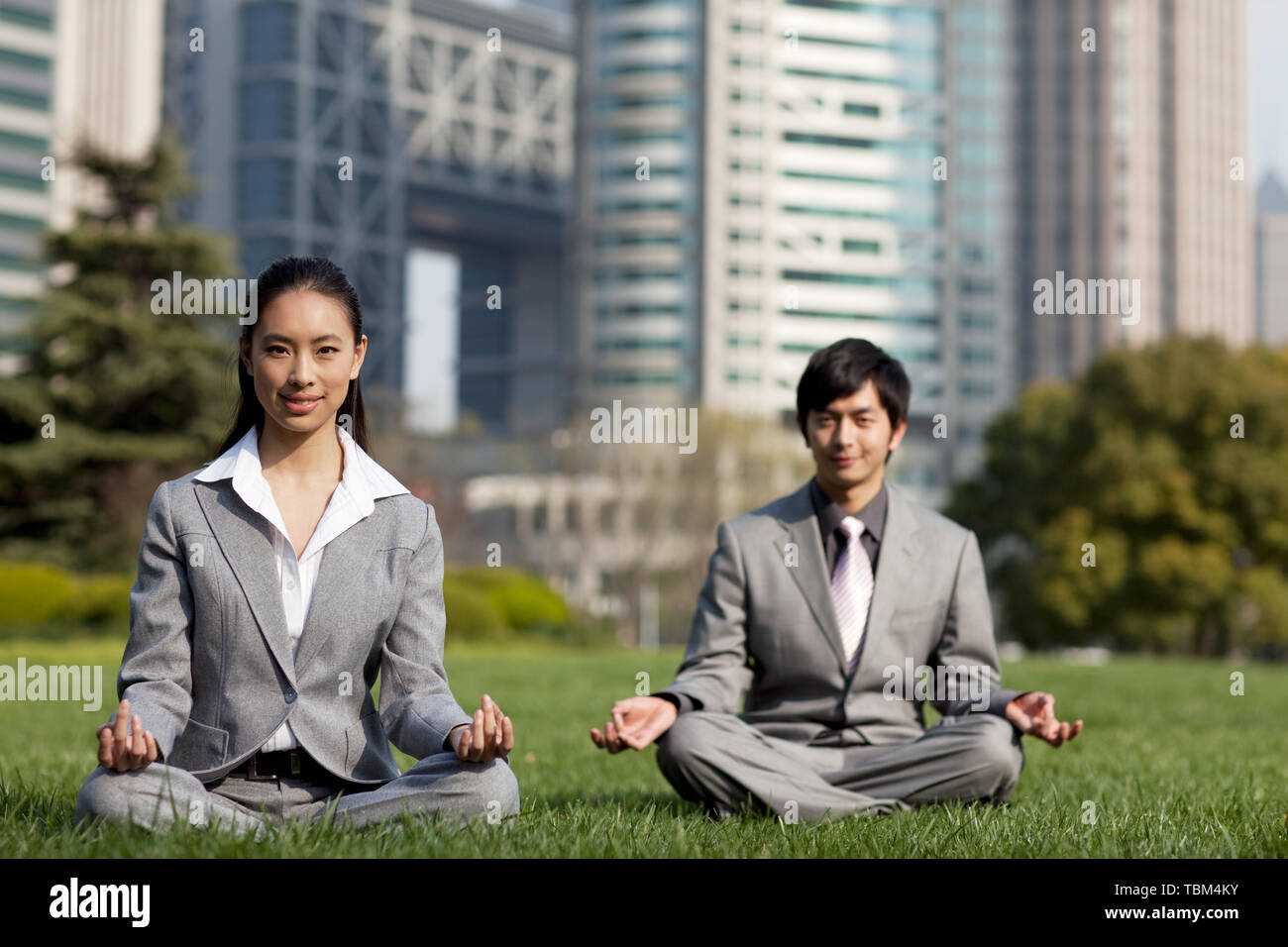 Business people practice yoga outdoors Stock Photo - Alamy