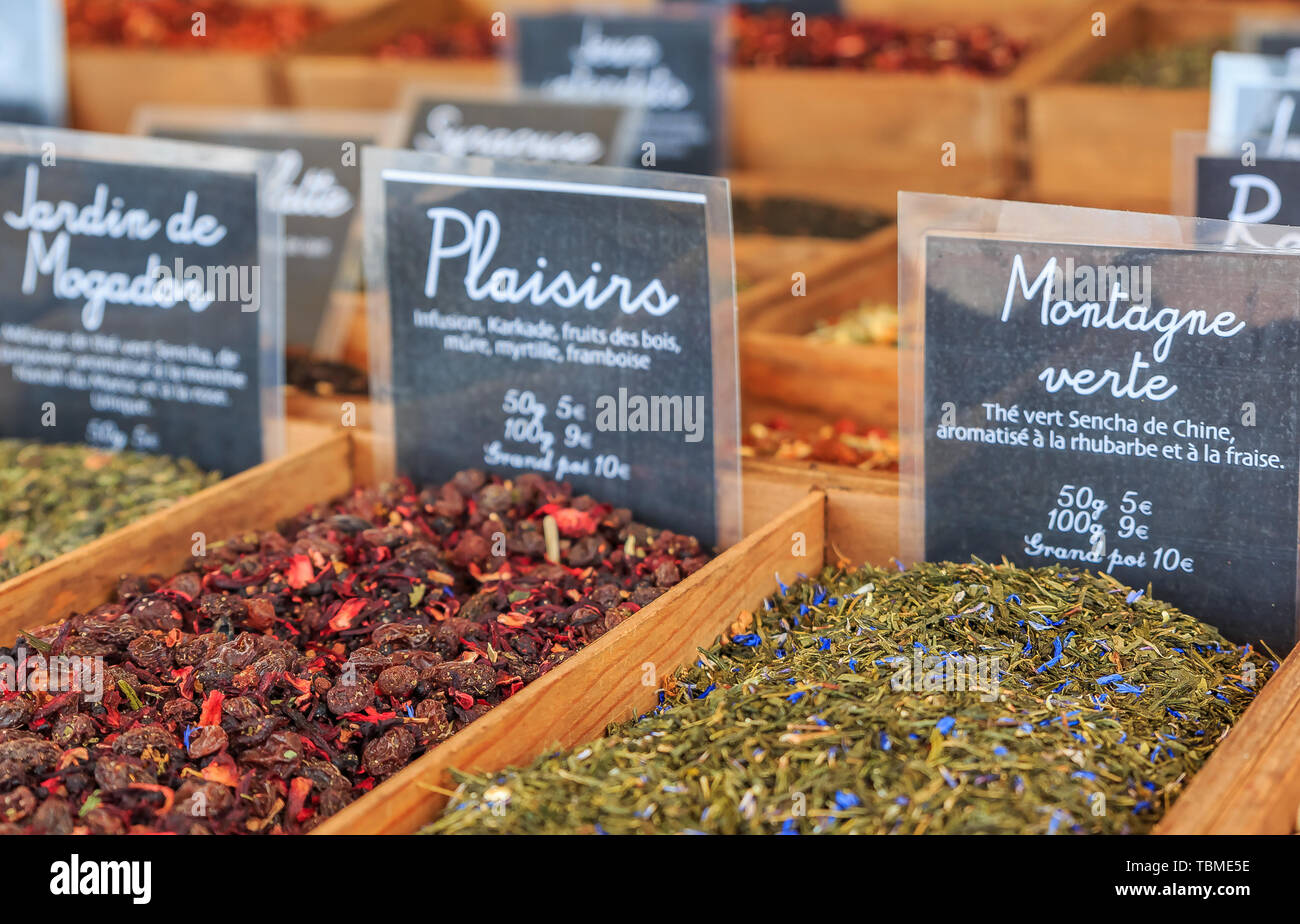 Exotic flavored teas with rhubarb, strawberry, hibiscus and other flavors for sale at a local outdoor farmers market in Nice, France Stock Photo