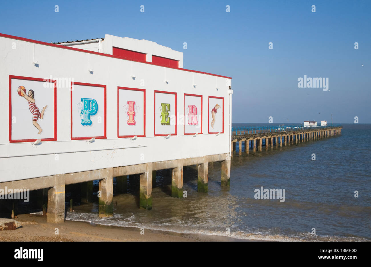 The pier, beach and North Sea coast at Felixstowe, Suffolk, England, UK Stock Photo