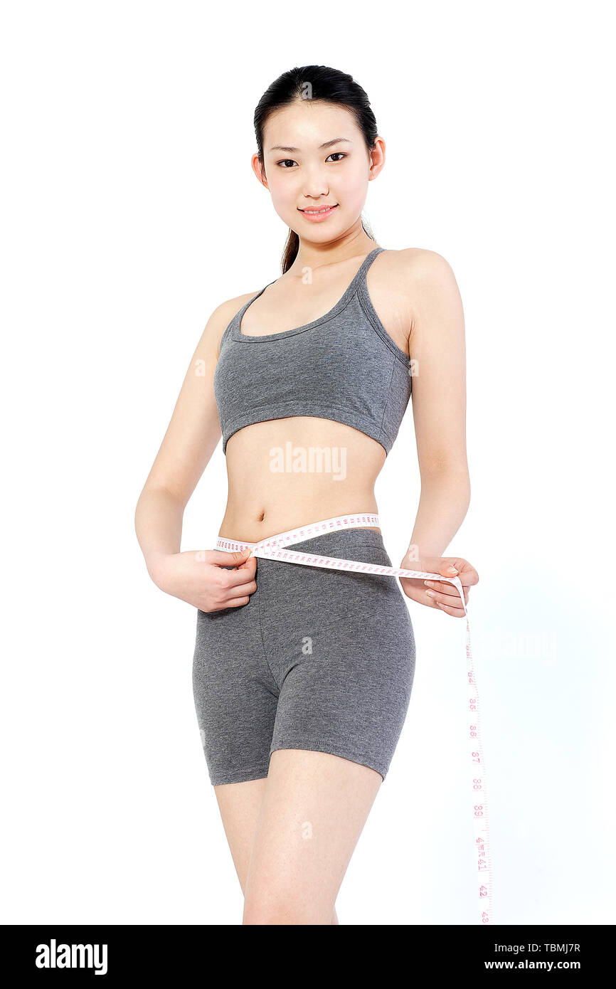 A woman loses weight through yoga Stock Photo Alamy