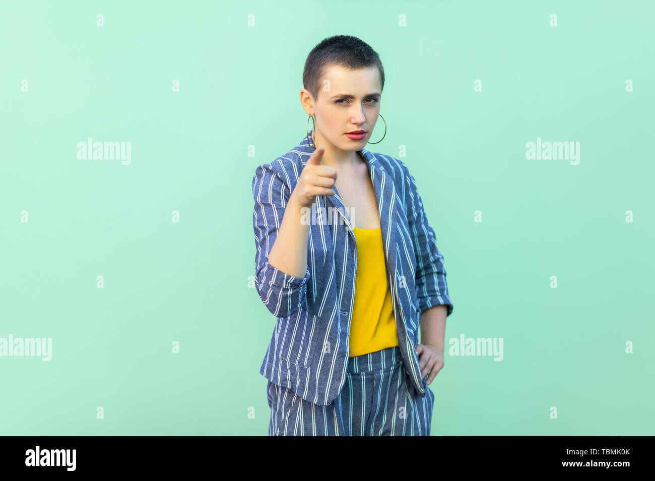 Portrait Of Serious Handsome Beautiful Short Hair Young Stylish