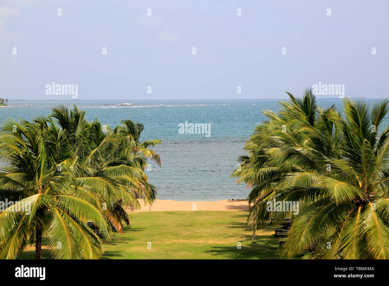 View over beach to ocean Amaya Beach Resort and Spa hotel, Pasikudah Bay, Eastern Province, Sri Lanka, Asia Stock Photo