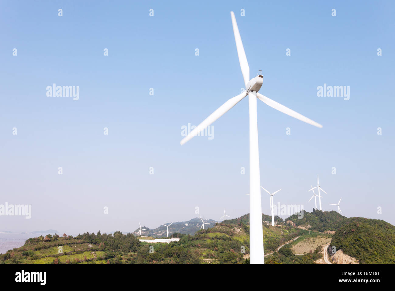 Wind Turbines with blue sky Stock Photo - Alamy