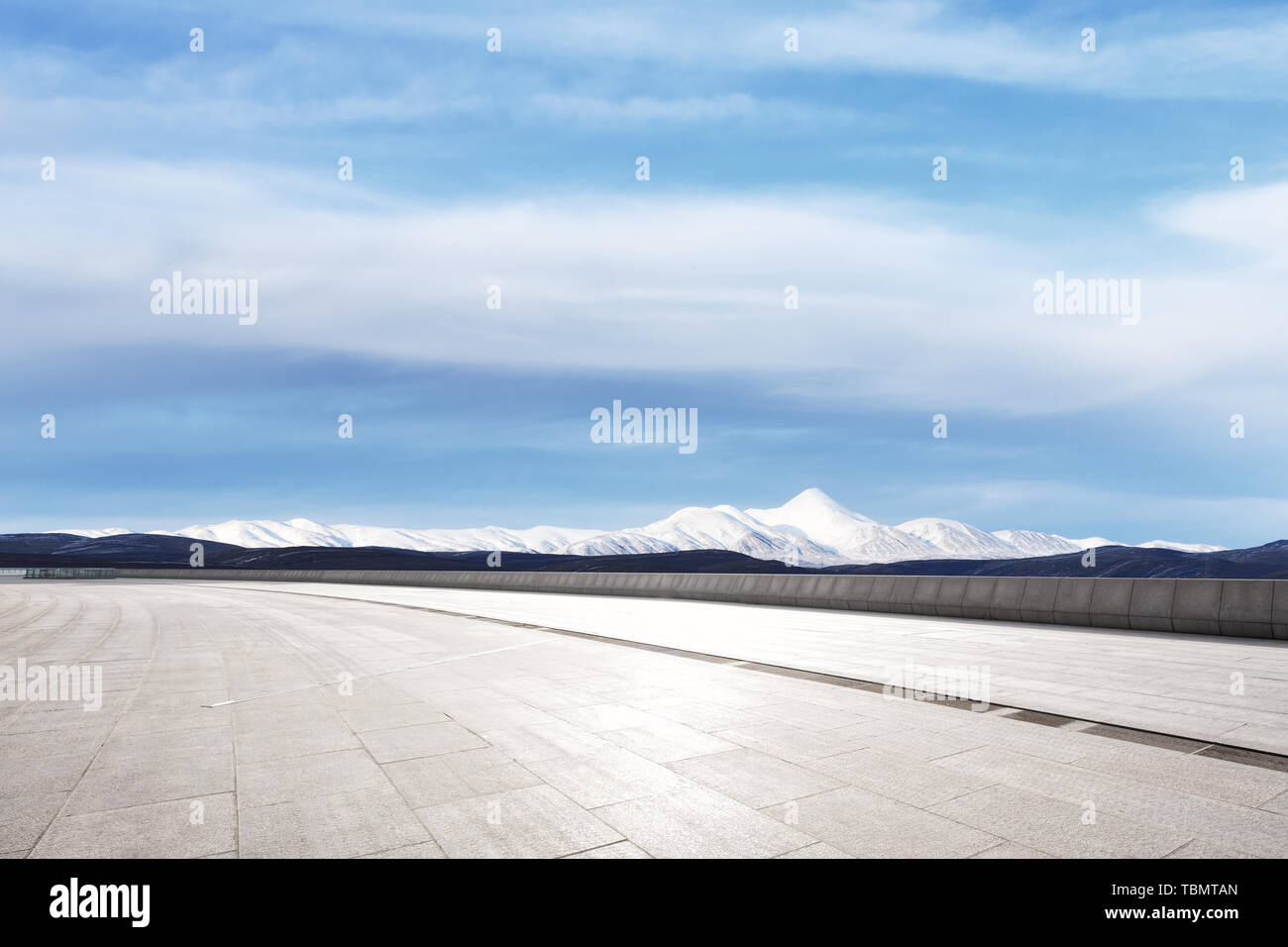 Empty marble floor with snow mountains Stock Photo