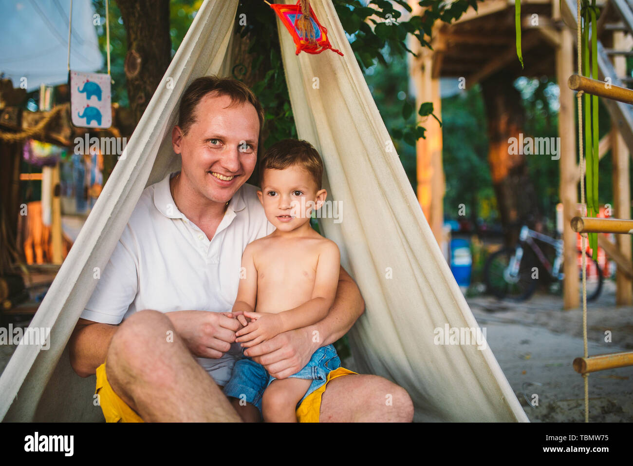 Subject Parenting, summer vacations, father and little son. Young