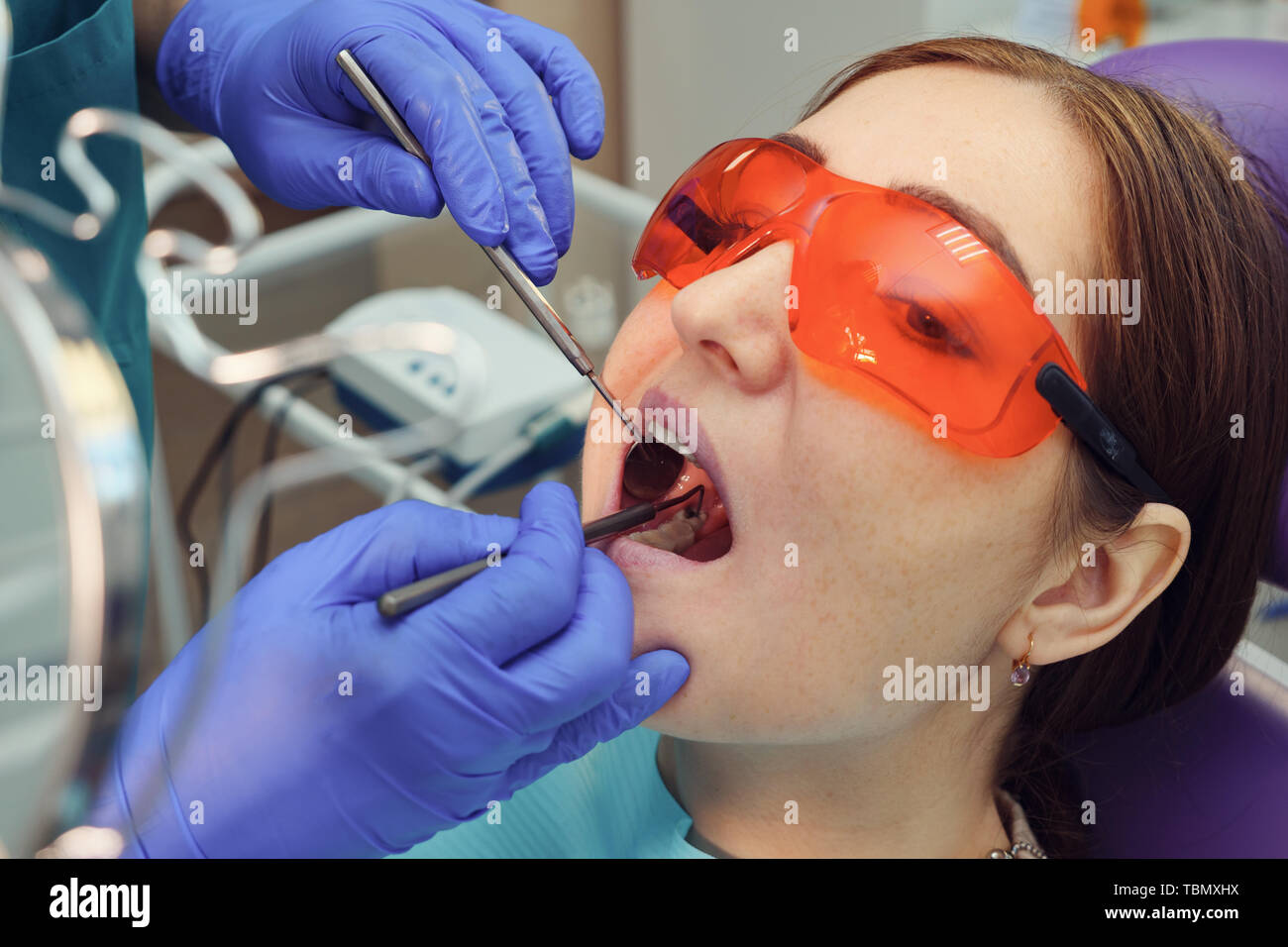 Closeup open mouth dental tools hi-res stock photography and images - Alamy