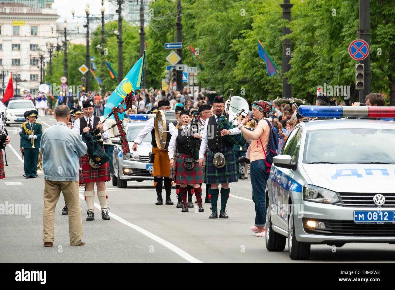 Military music bands marching through the empty streets of the city of