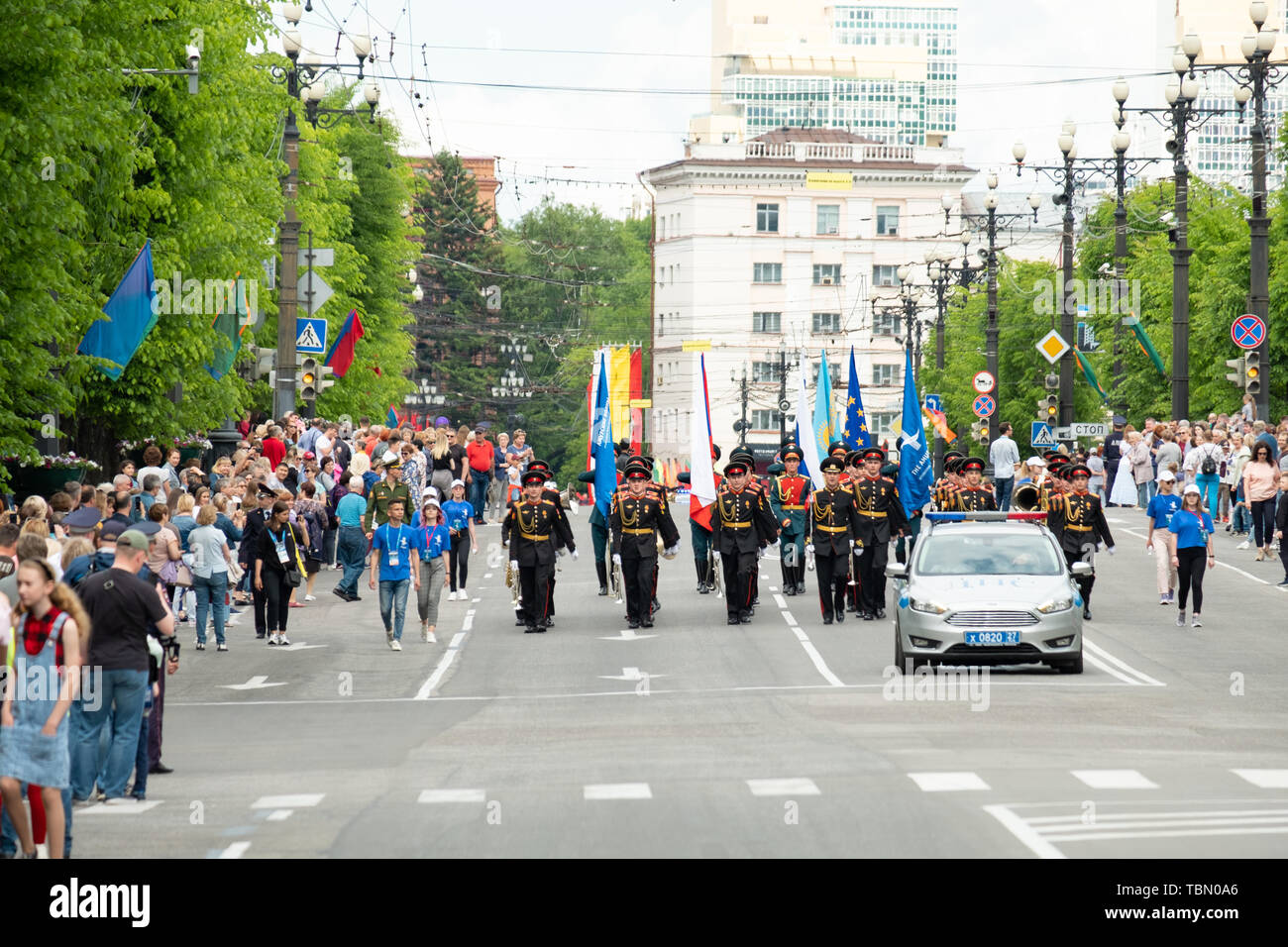 Military music bands marching through the empty streets of the city of