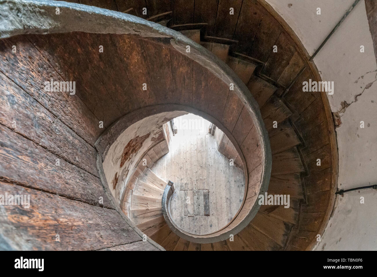 View down wooden spiral staircase at Upnor Castle. Stock Photo