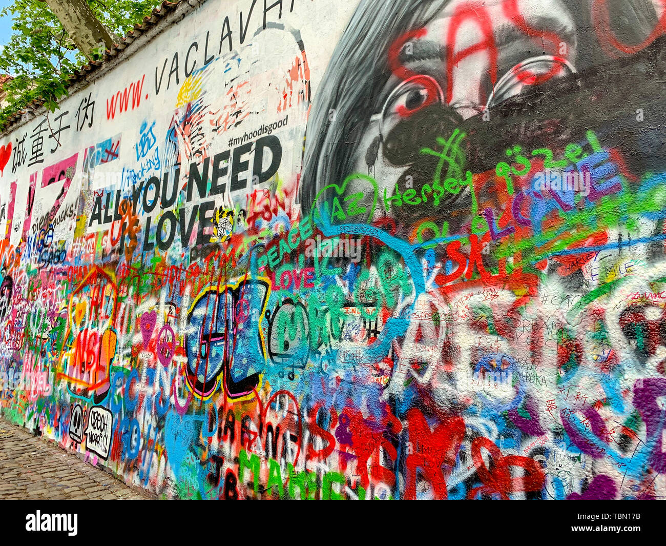 Prague, Czech Republic - May 18, 2019 :  Colorful graffiti  of John Lennon Wall  in Prague, Czech Republic. Stock Photo