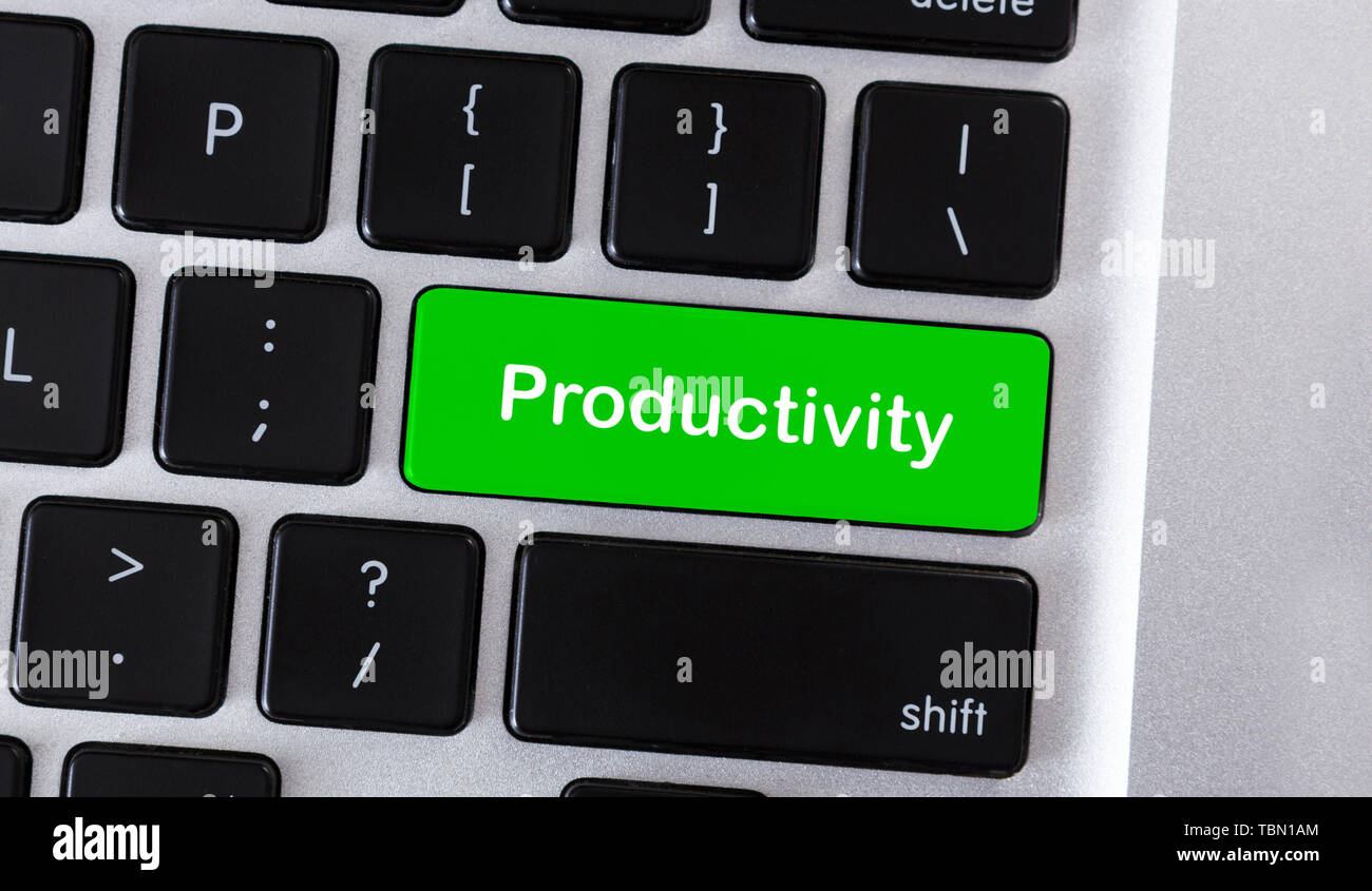 Text Productivity on green button of computer keyboard Stock Photo