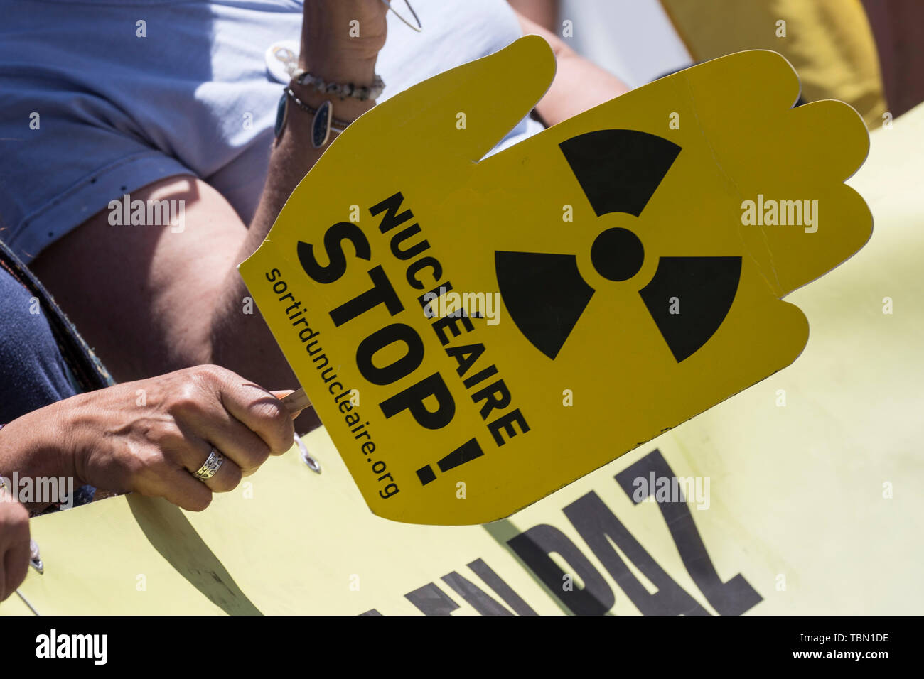 Stop nuclear energy placard during he protest. Ecologists from the Iberian Peninsula accompanied by activists from the United States, Turkey, France and Argentina, protested in Madrid for the closure of nuclear power plants, uranium mines and high-level radioactive waste management. In addition, activists have protested a new energy model to avoid cases such as Chernobyl in Ukraine and have demanded the closure of the Almaraz Nuclear Power Plant in Spain. Stock Photo