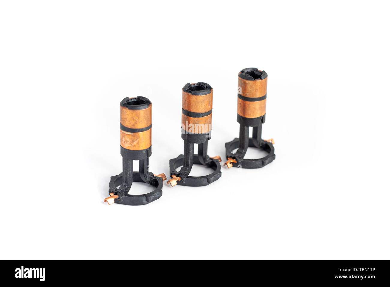 Alternator slip rings on isolated white background. Auto electrical