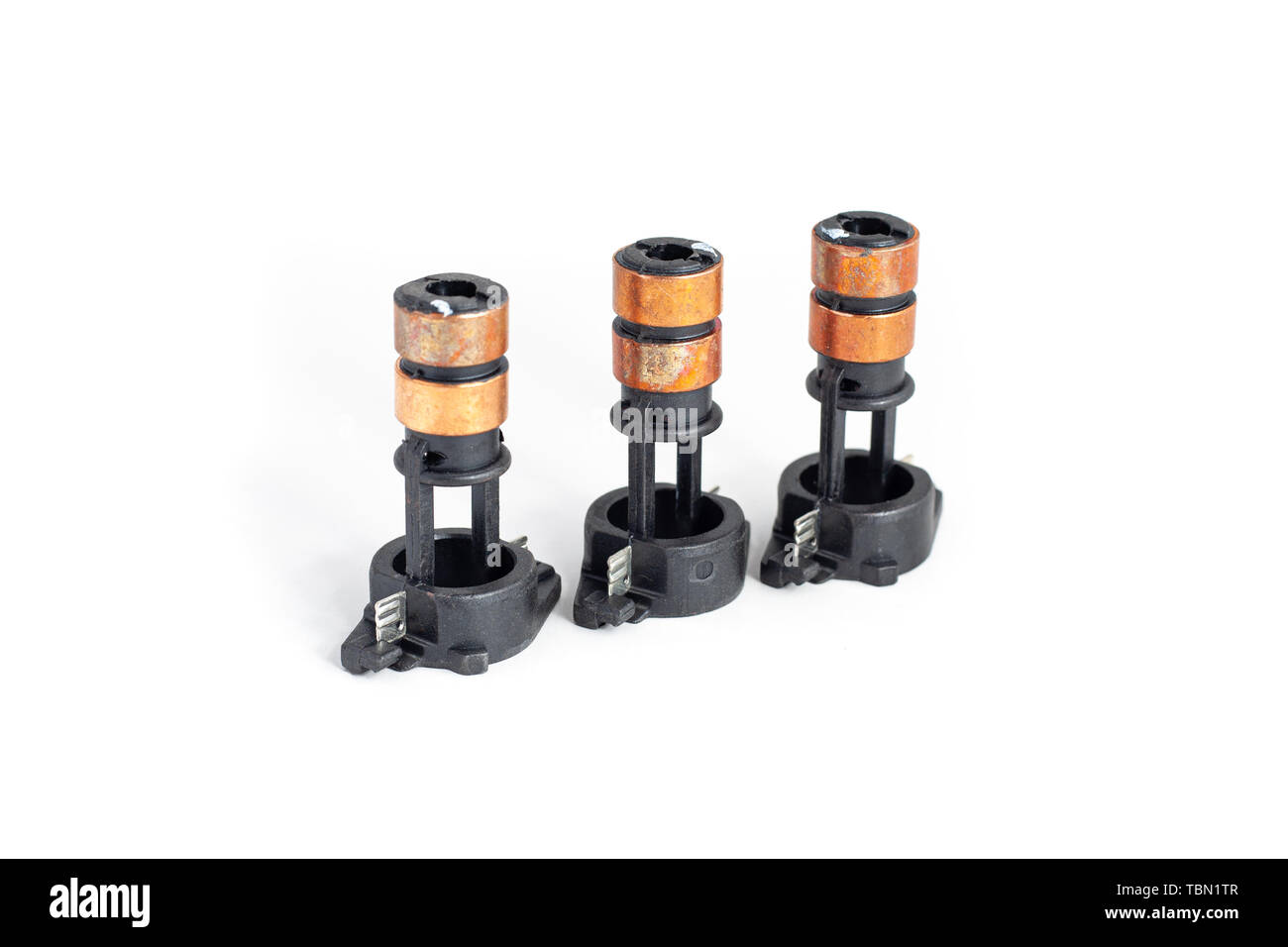 Alternator slip rings on isolated white background. Auto electrical
