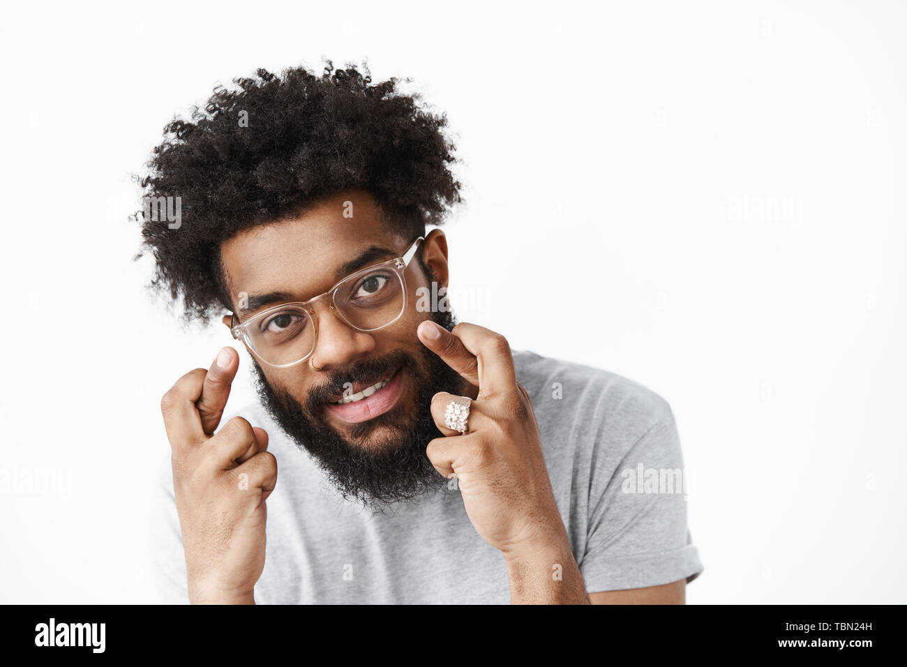 Optimistic And Joyful African American Bearded Guy With Afro