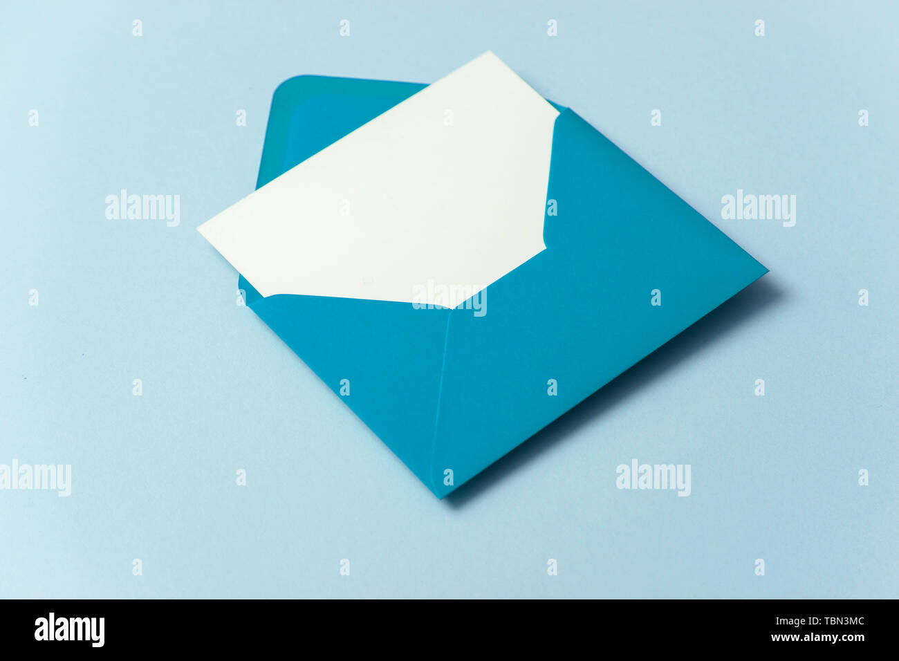 Blank white card with blue paper envelope template mock up Stock Photo