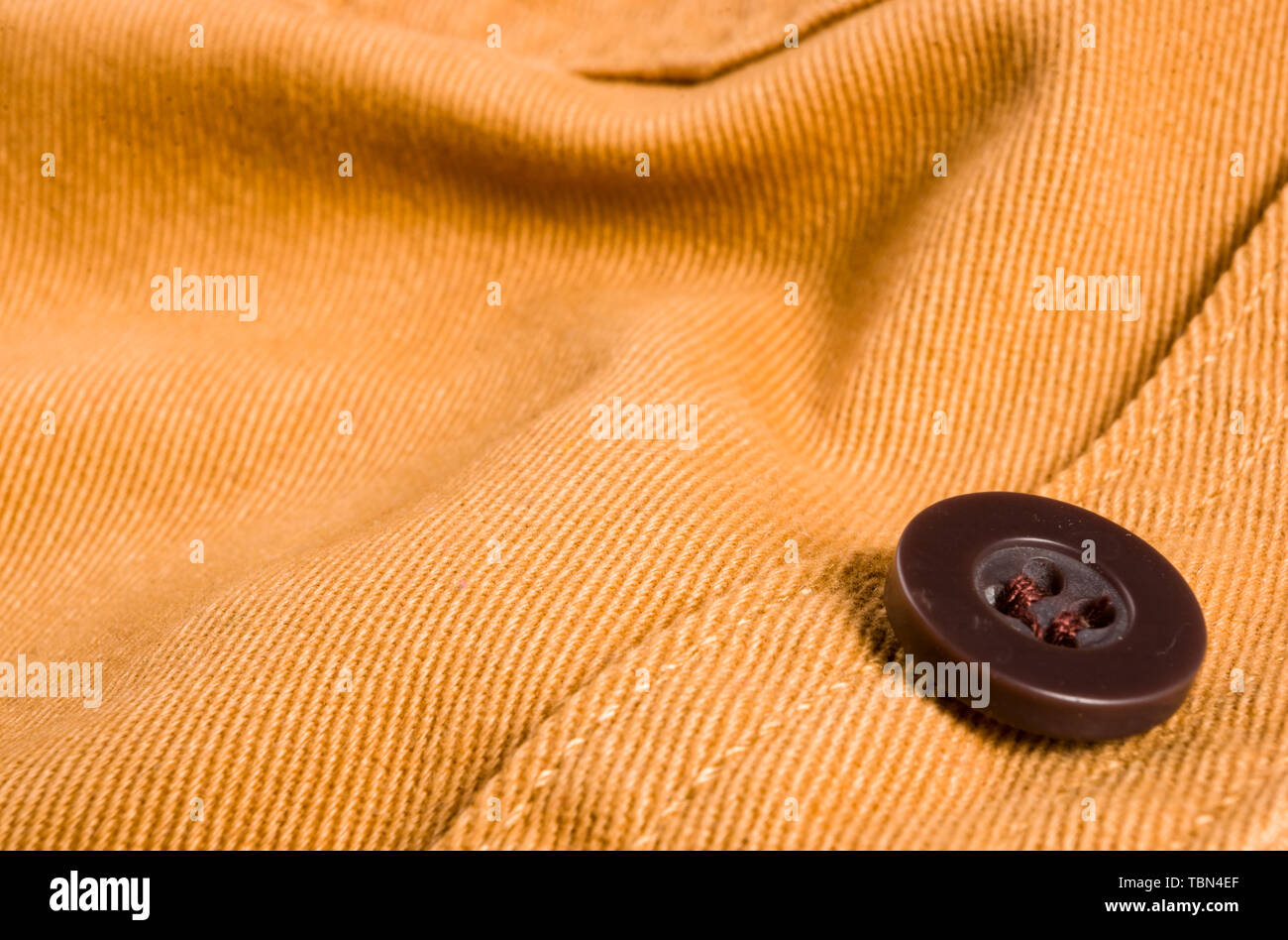 clothing items washed cotton fabric texture with seams, clasps, buttons ...