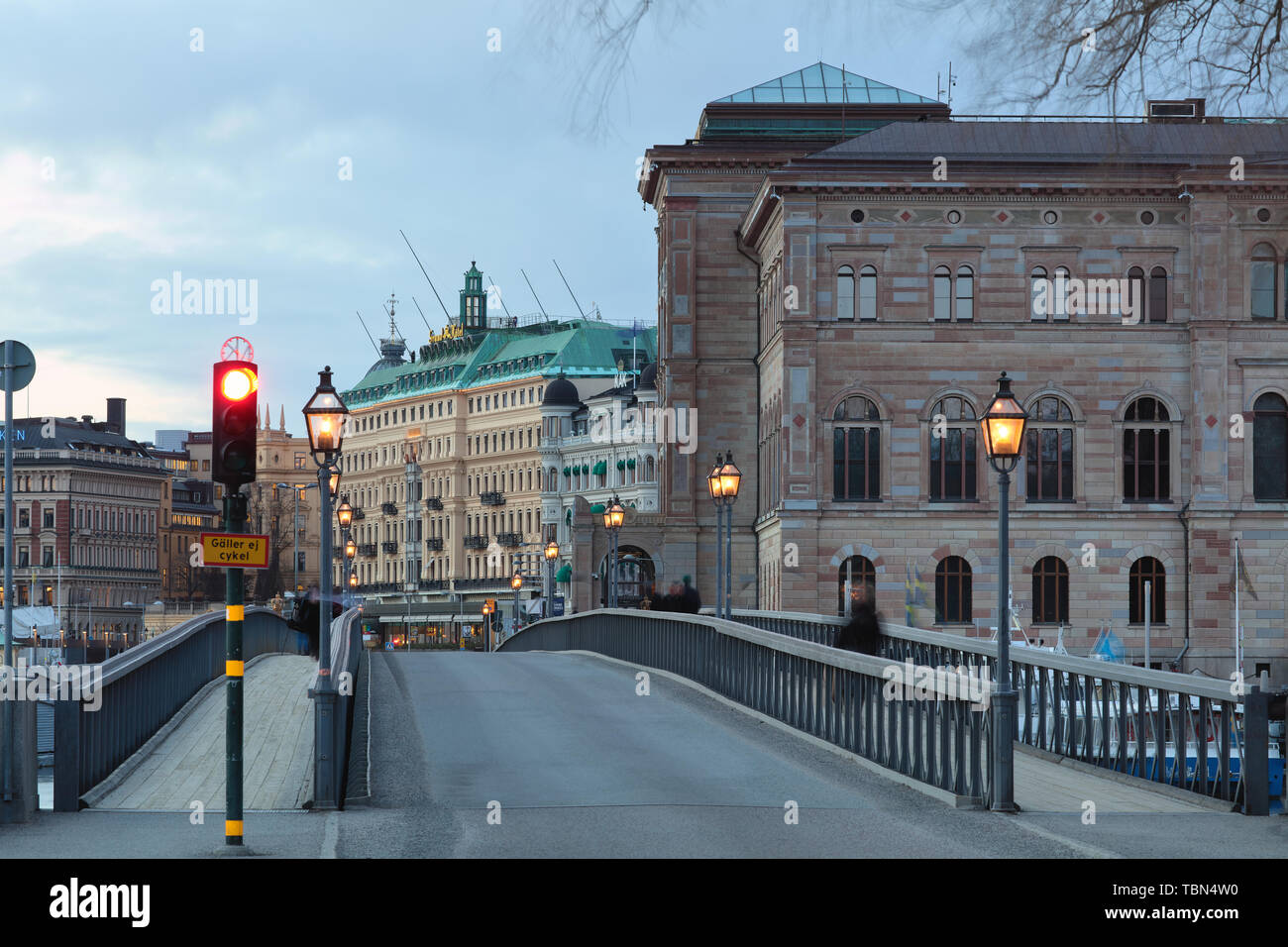 Skeppsholmsbron and Södra Blasieholmshamnen behind in Stockholm, Sweden Stock Photo