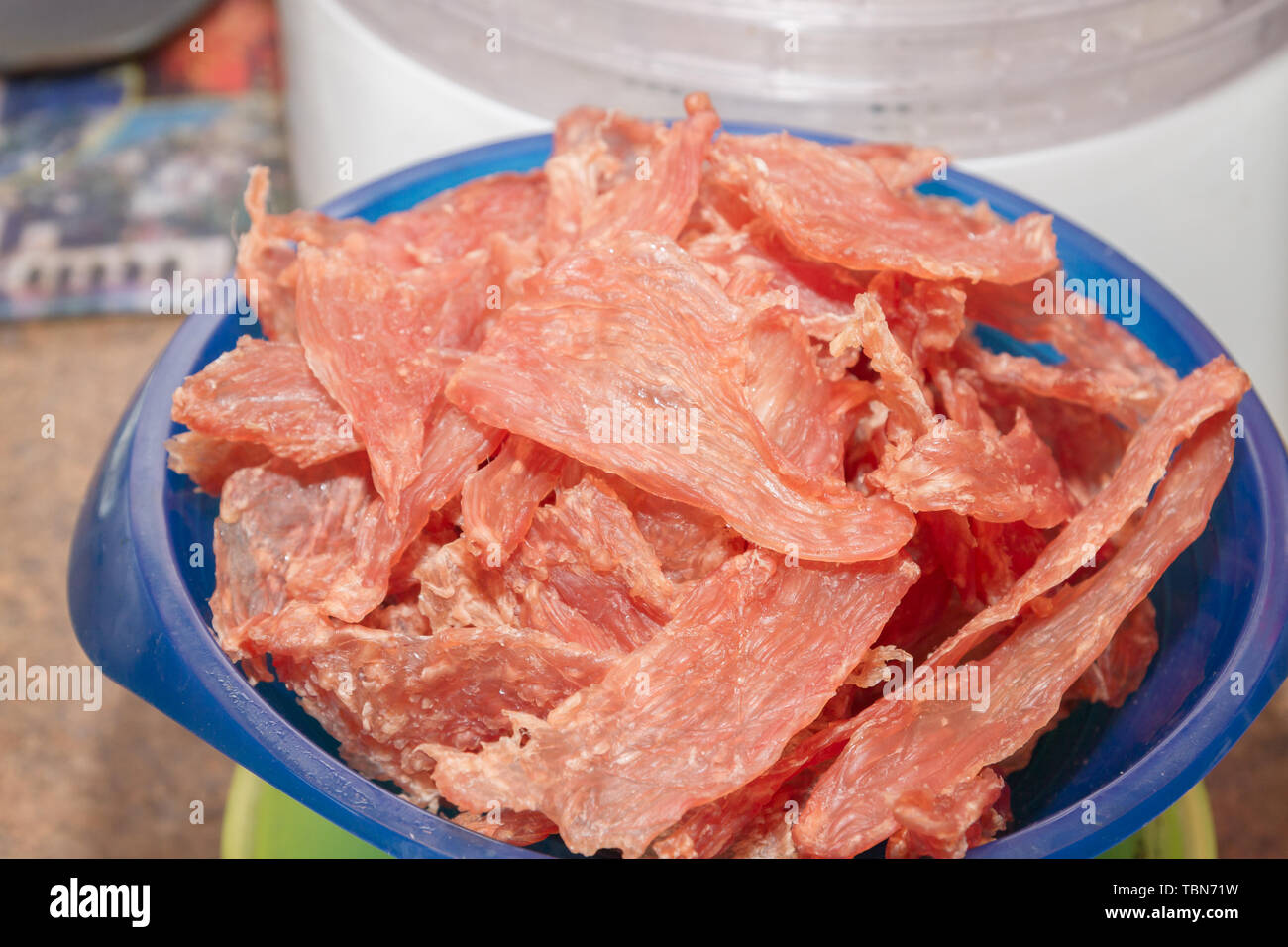https://c8.alamy.com/comp/TBN71W/dried-meat-300-grams-lies-on-plastic-scales-TBN71W.jpg