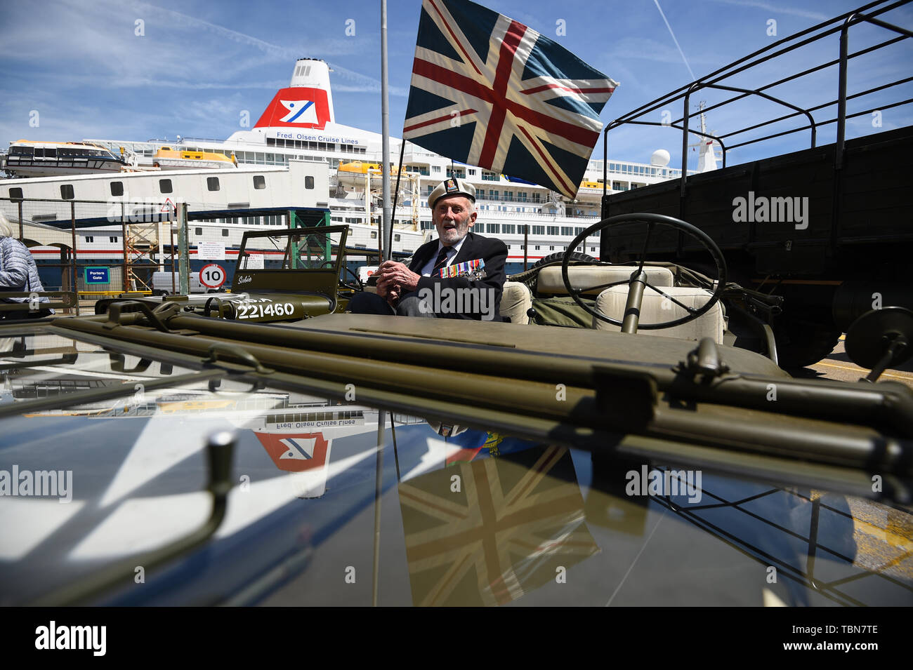 Veteran John Roberts, 95, from Whitstable, on a jeep as he arrives to the cruise termianl to board the MV Boudicca (behind) ahead of its departure from the port of Dover in Kent, on day one of a trip arranged by the Royal British Legion for D-Day veterans to mark the 75th anniversary of D-Day. Stock Photo