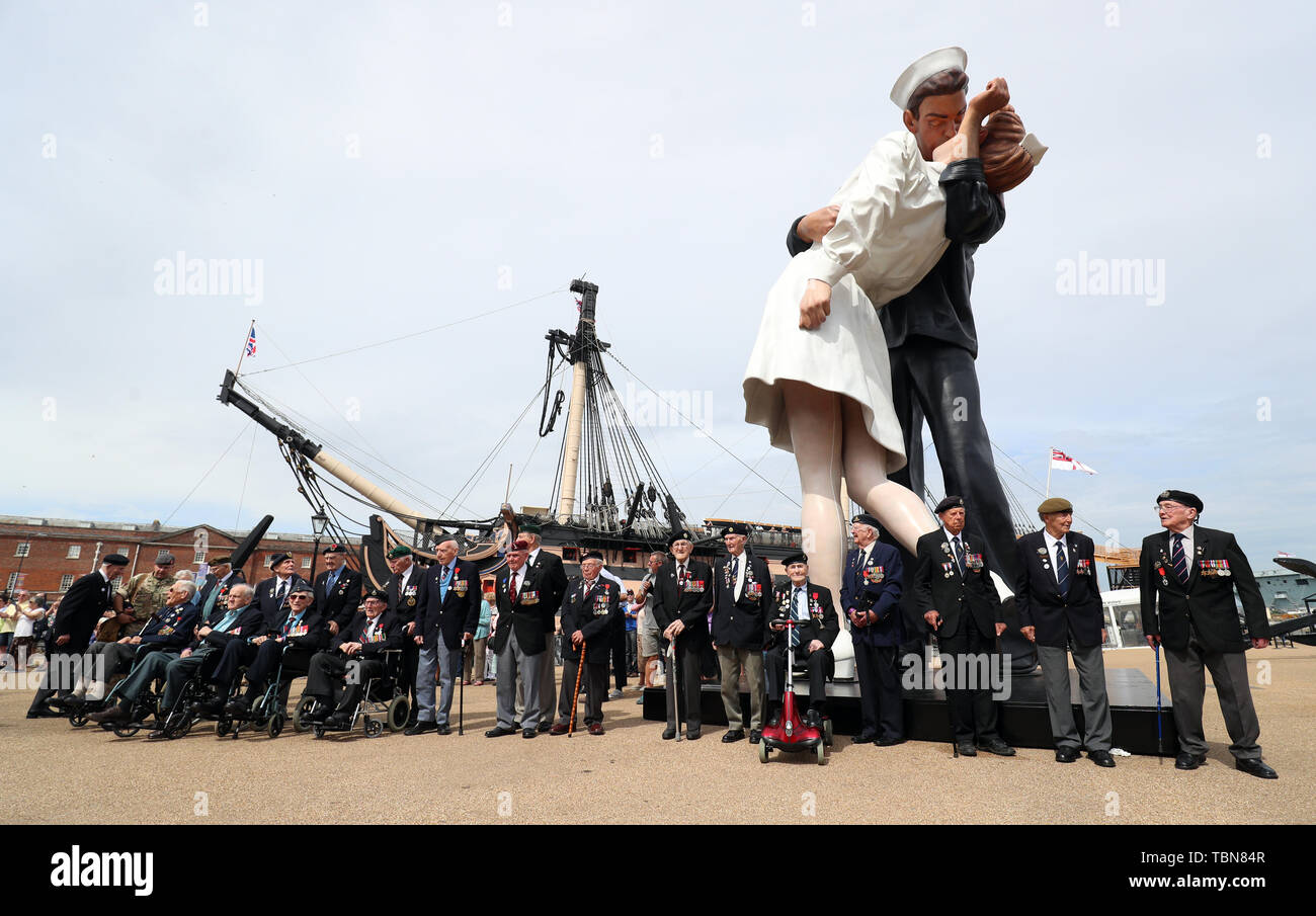 DDay veterans gather under the 'EmbRacing Peace' statue, during a D