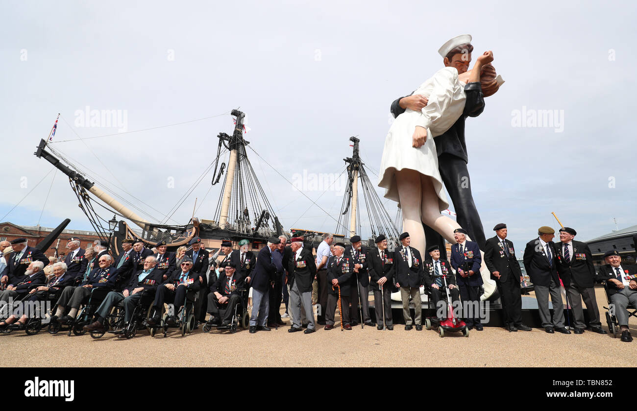 DDay veterans gather under the 'EmbRacing Peace' statue, during a D