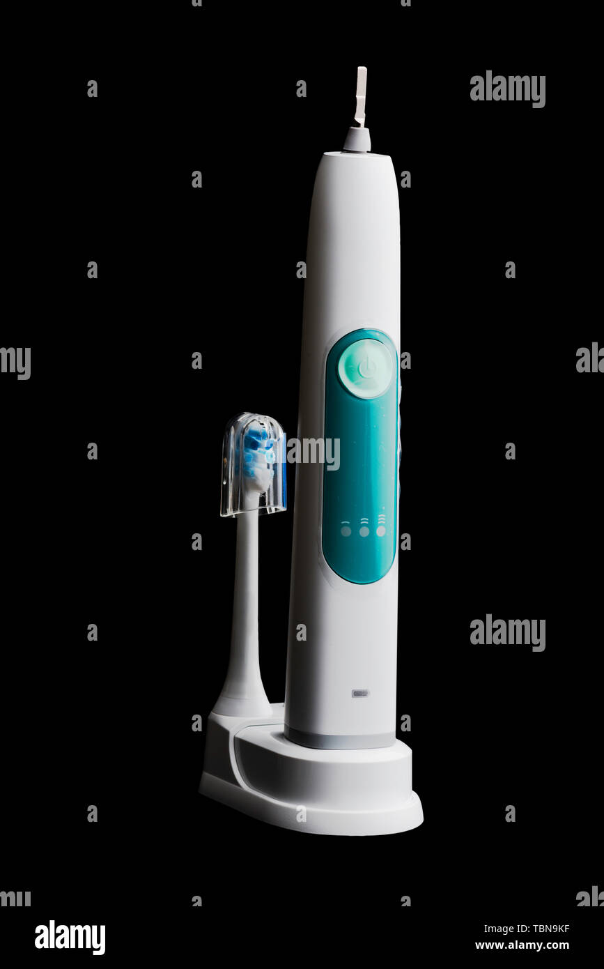 power tooth brush on black Stock Photo