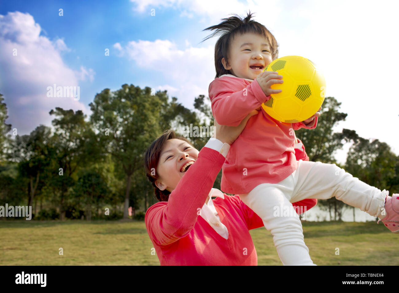 Daughter on outing with mother in park Stock Photo Alamy