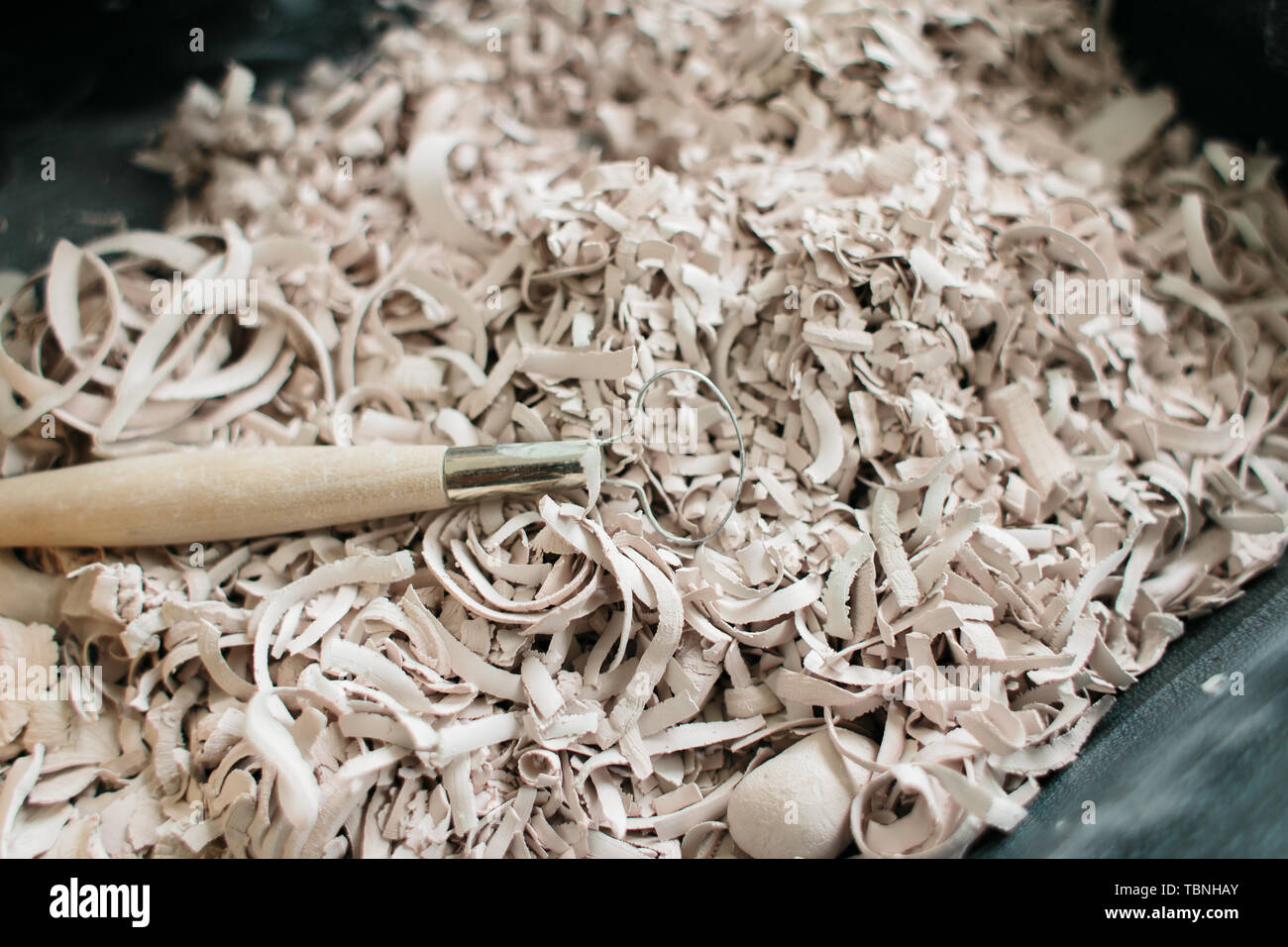 pottery tools for carving ceramic products in workshop Stock Photo