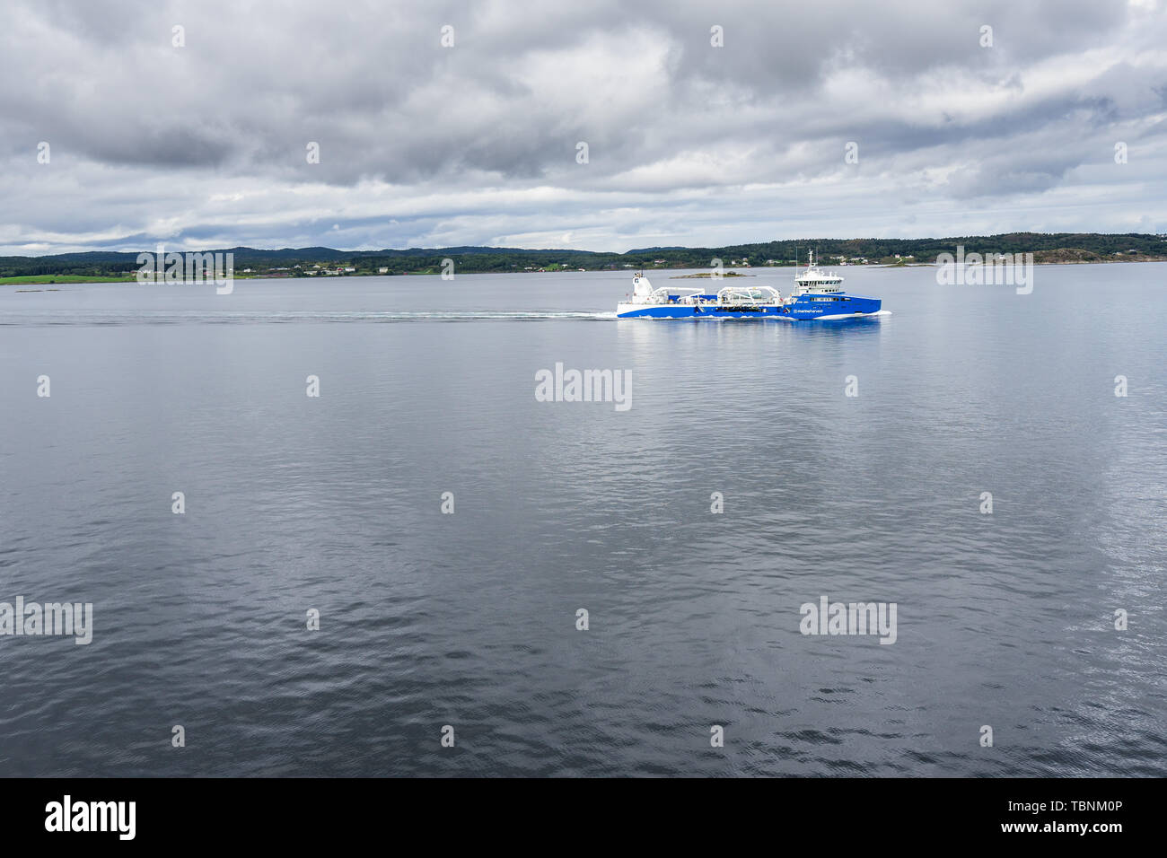 Marine Harvest Gaso Jarl fishing vessel sailing in Norwegian fjords. Vestlandet, Norway, August 2018 Stock Photo