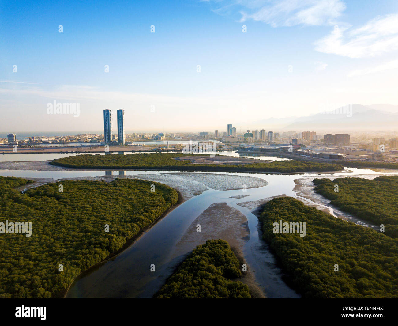 Panoramic view of Ras al Khaimah over mangrove forest in the UAE United Arab Emirates aerial Stock Photo