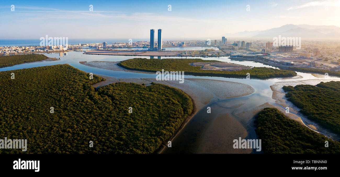 Panoramic view of Ras al Khaimah over mangrove forest in the UAE United Arab Emirates aerial Stock Photo