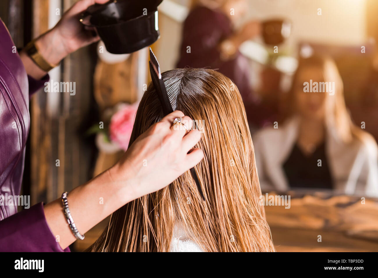 Close up shot of hands of hairdresser with brush applying mask or conditioner to hair of her client in beauty hair salon. Spa, care, hair health, prob Stock Photo - Alamy Close up shot of hands of hairdresser with brush applying mask or conditioner to hair of her client in beauty hair salon. Spa, care, hair health, prob Stock Photo - Alamy