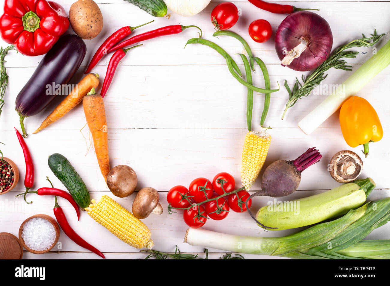 Healthy food.Big set of fresh vegetables on a wite background . Vegan ...