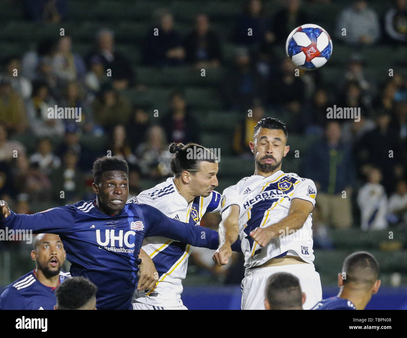 Los Angeles, California, USA. 2nd June, 2019. LA Galaxy forward Zlatan Ibrahimovic (9) of Sweden, and defender Giancarlo Gonzalez (21) fight for a head ball against New England Revolution defender Jalil Anibaba (3) during the 2019 Major League Soccer (MLS) match between LA Galaxy and New England Revolution in Carson, California, June 2, 2019. Credit: Ringo Chiu/ZUMA Wire/Alamy Live News Stock Photo