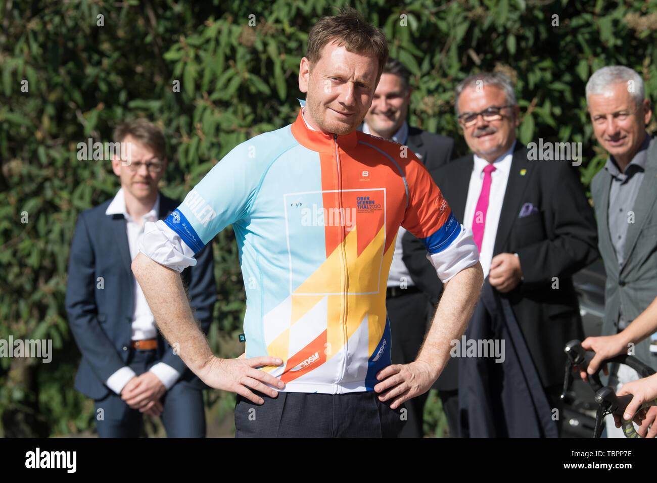 Dresden, Germany. 03rd June, 2019. Michael Kretschmer (CDU), Prime Minister of Saxony, wears a cycling jersey for the start of the summer cycle tour for the upcoming Nordic Junior World Championship 2020 in Oberwiesenthal, Saxony. On the same day, organisers and athletes from Dresden will start by bicycle in the direction of Oberwiesenthal to draw attention to this major event. Credit: Sebastian Kahnert/dpa-Zentralbild/ZB/dpa/Alamy Live News Stock Photo
