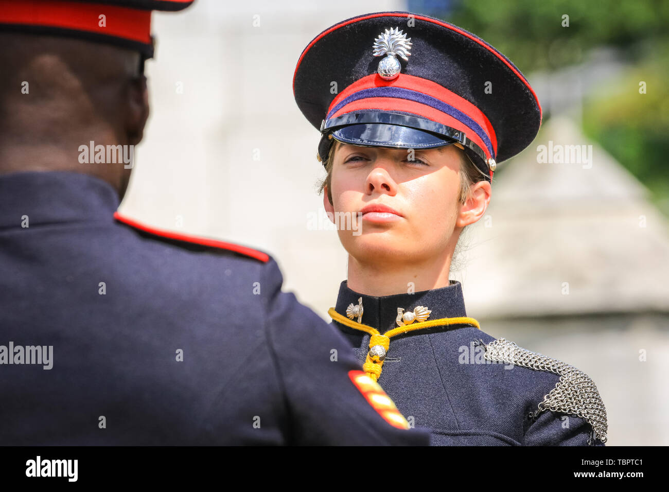 London, UK, 03rd June 2019. A young female soldier rides in a military vehicle. A 103 round gun salute by the Honourable Artillery Company at HM Tower of London is fired at midday. The 103 rounds are:  41 to mark 66 years since HM The Queen’s coronation, 41 to mark the state visit of the President of the United States, and 21 for the City of London. Credit: Imageplotter/Alamy Live News Stock Photo