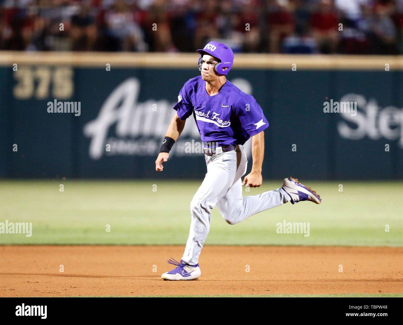 June 2, 2019: TCU base runner Johnny Rizer #4 moves between second and third. Arkansas defeated TCU 6-0 in Fayetteville, AR, Richey Miller/CSM Stock Photo