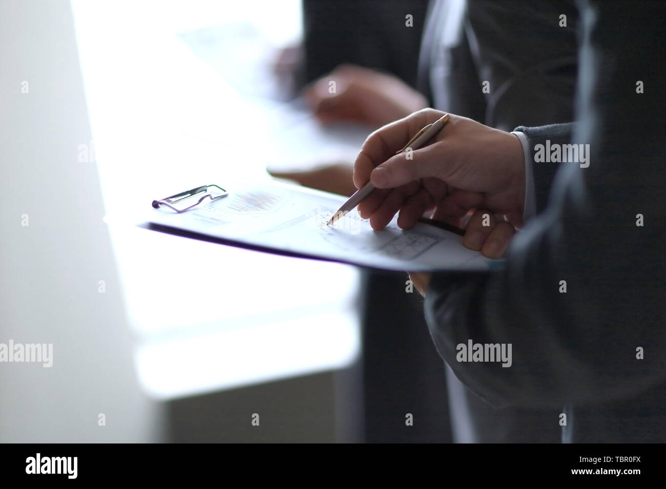 Businessman analyzing data checking charts hi-res stock photography and ...