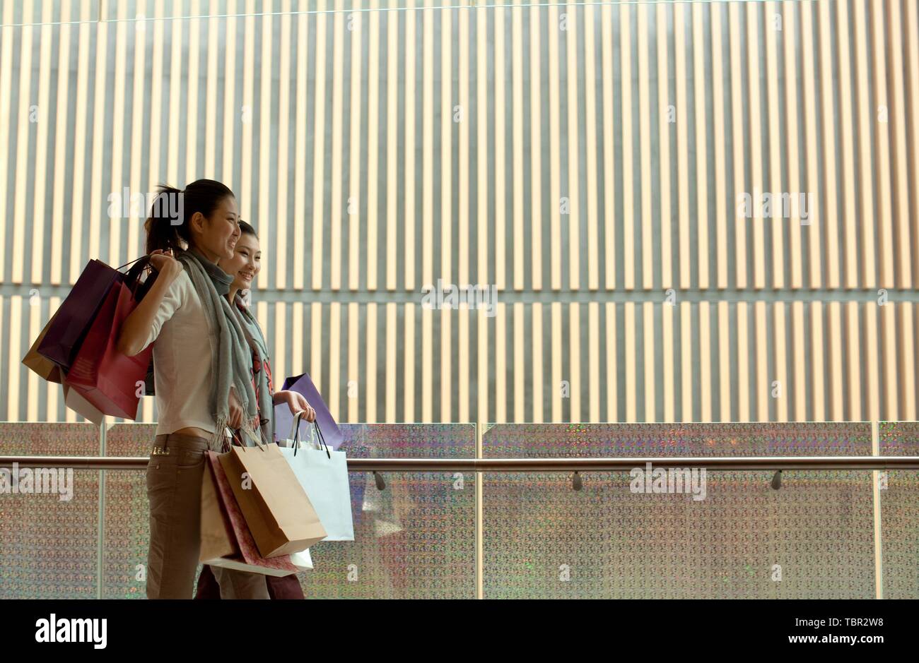 Asian woman walking shopping hi-res stock photography and images - Alamy