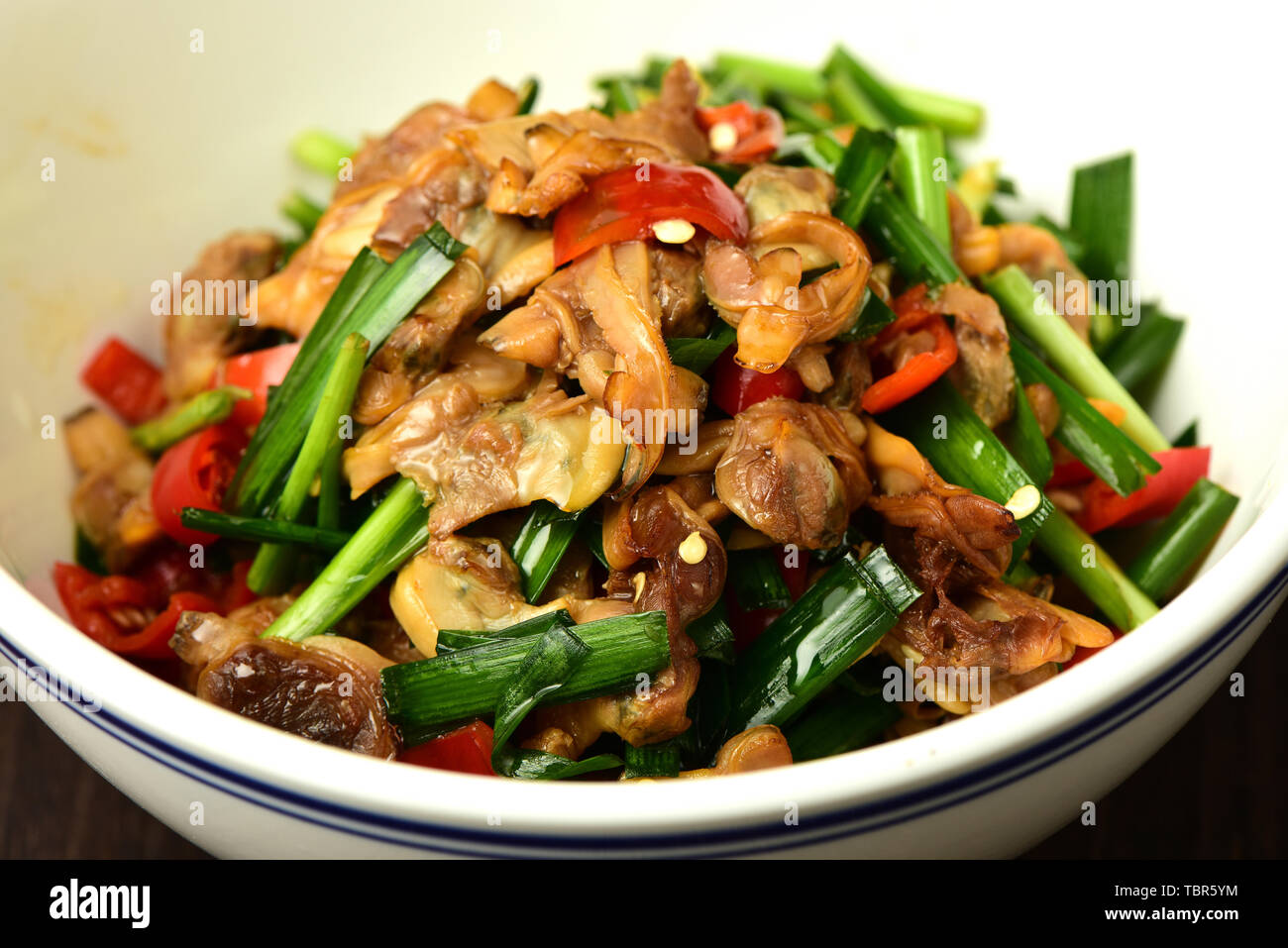 Spicy leeks stir-fry clam razor Stock Photo - Alamy