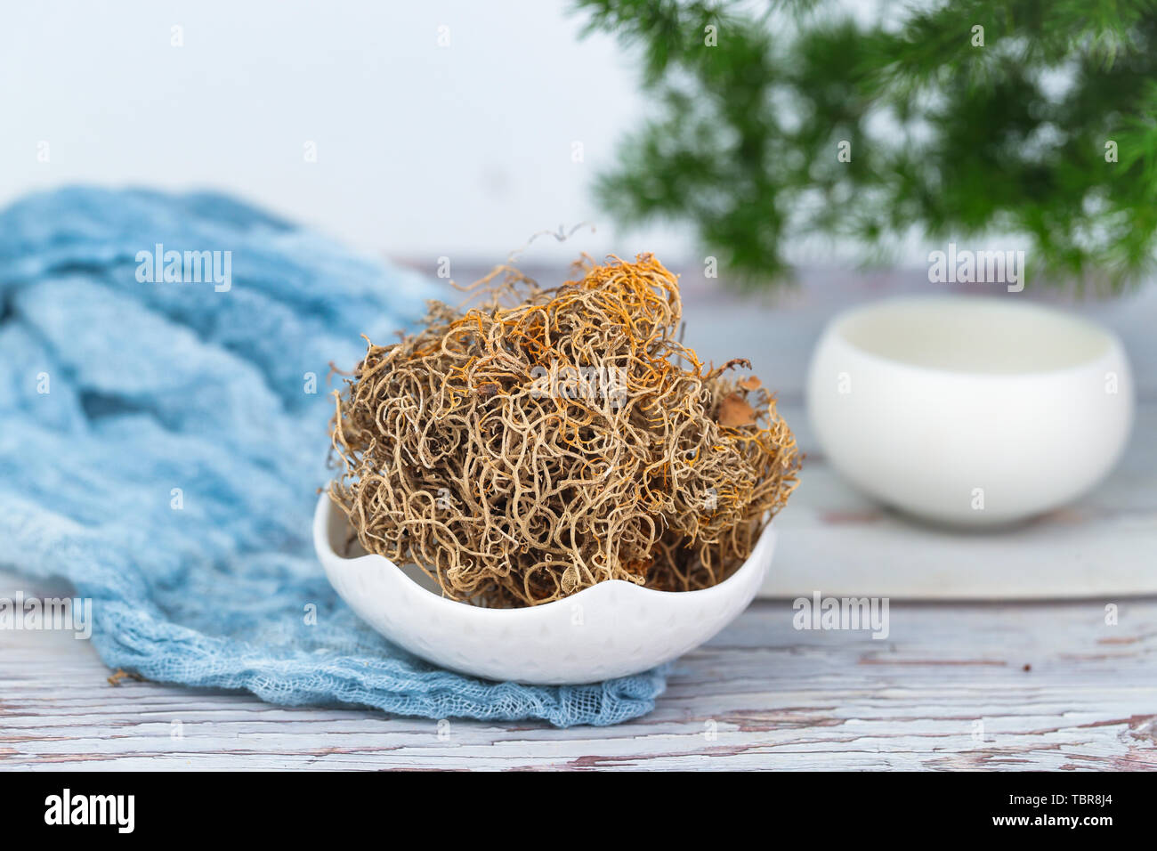 Black snow tea, gold silk tea Stock Photo Alamy