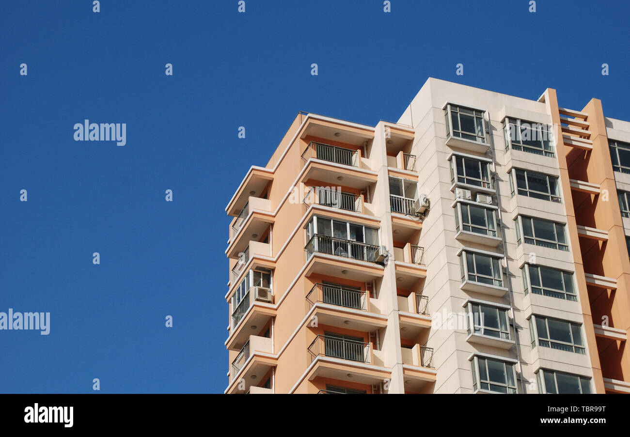Apartments and blue skies Stock Photo Alamy