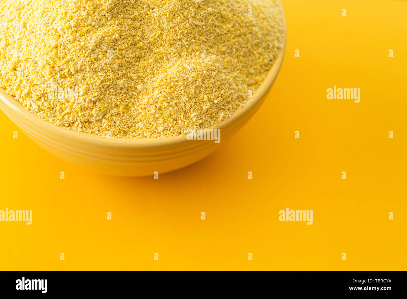 Bowl of Nigerian Yellow Garri in a Yellow bowl Stock Photo Alamy