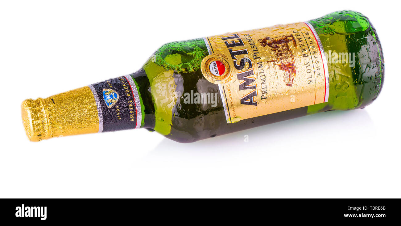 CHISINAU, MOLDOVA - March 16, 2018: Cold bottle of Amstel Premium lager beer on white background. Stock Photo