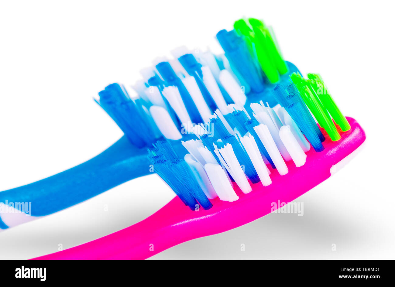 Two toothbrushes over white background Stock Photo