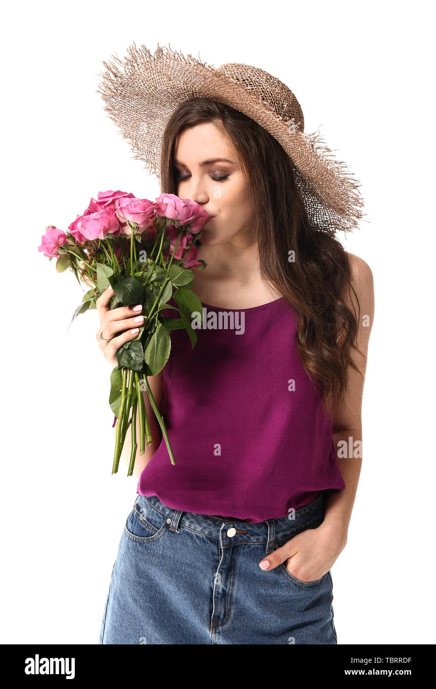 Beautiful young woman with bouquet of flowers on white background Stock ...