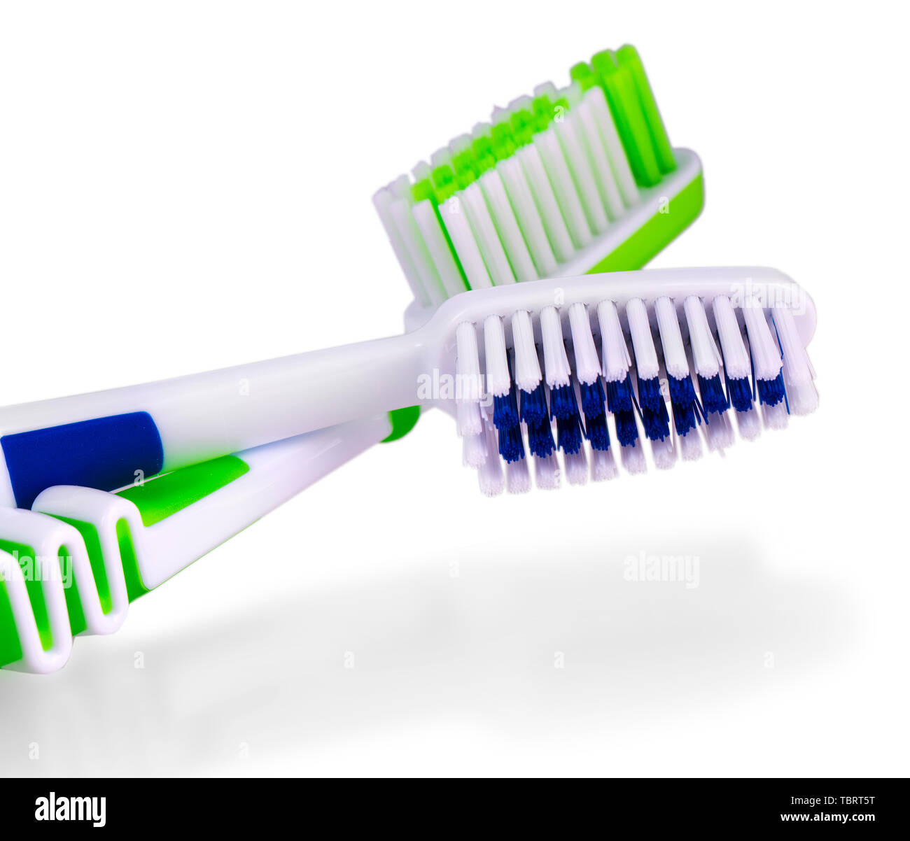 Two toothbrushes over white background Stock Photo